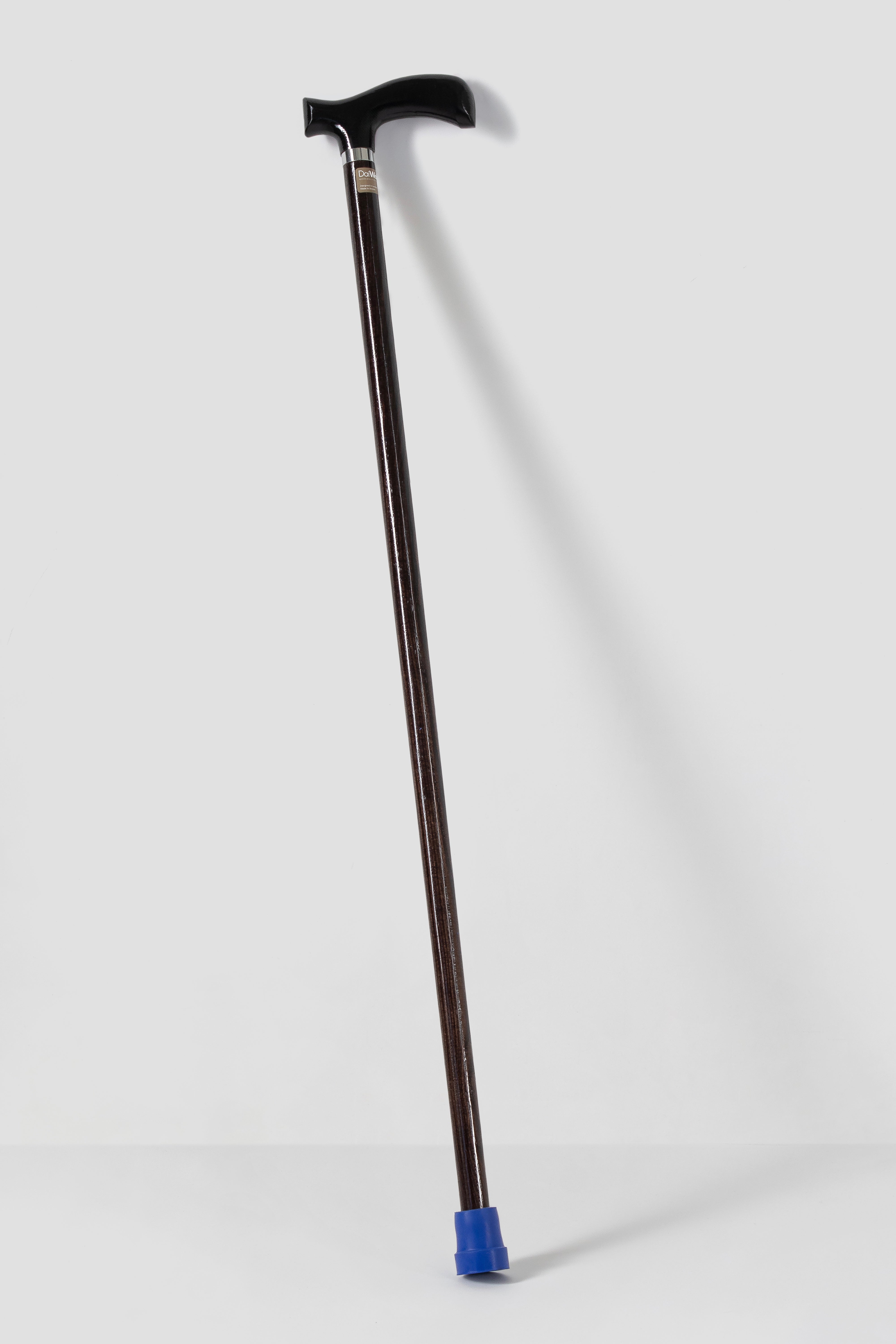 All black anatomical walking stick with dark walnut oak shaft. Premium designer cane with silent performance.