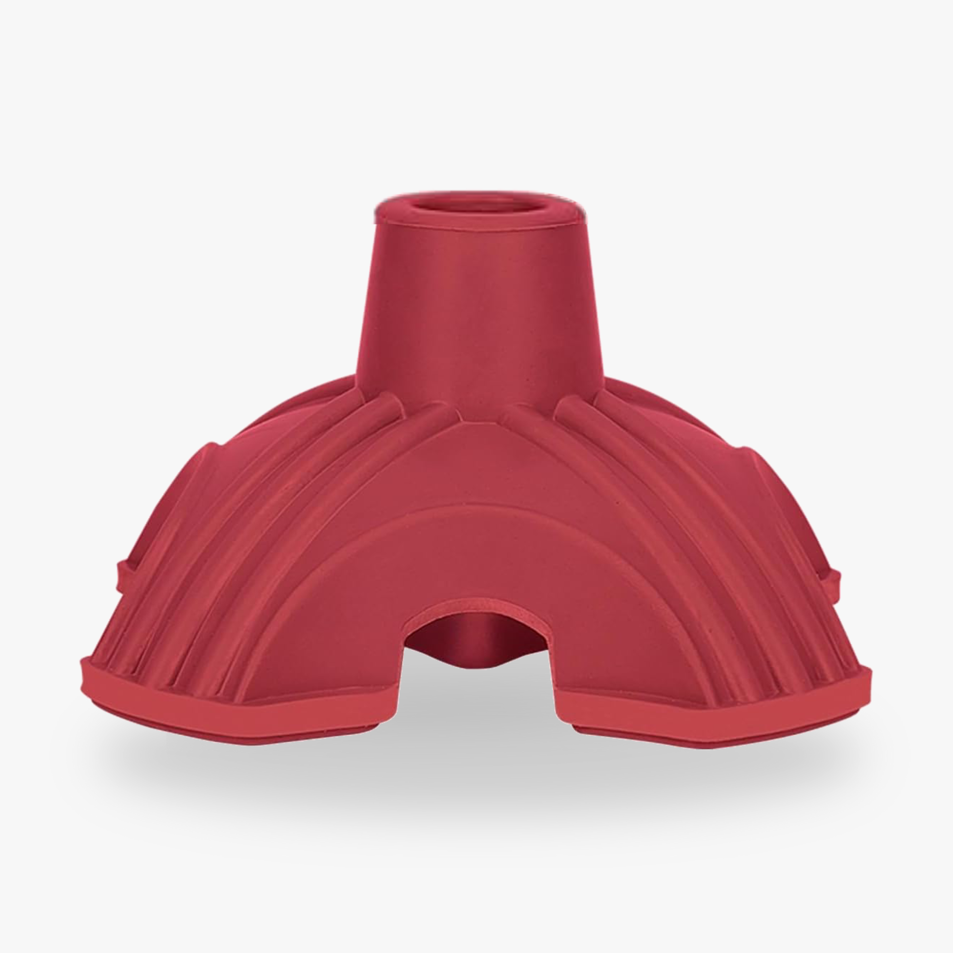 Freestanding rubber cane tip with tripod design.