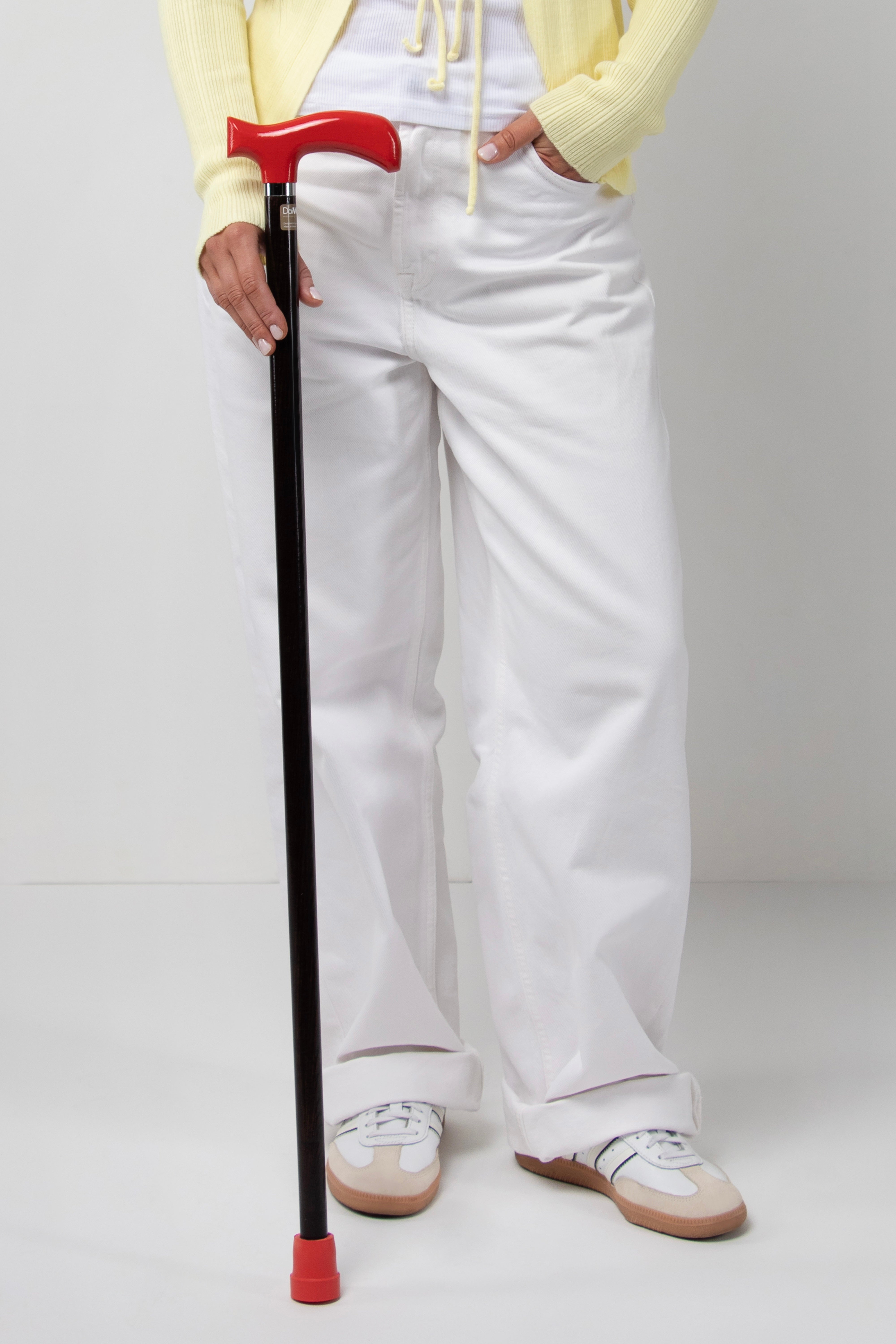 Power chic women's walking stick with crimson red handle on dark oak wood. Premium handmade designer cane for stable support.