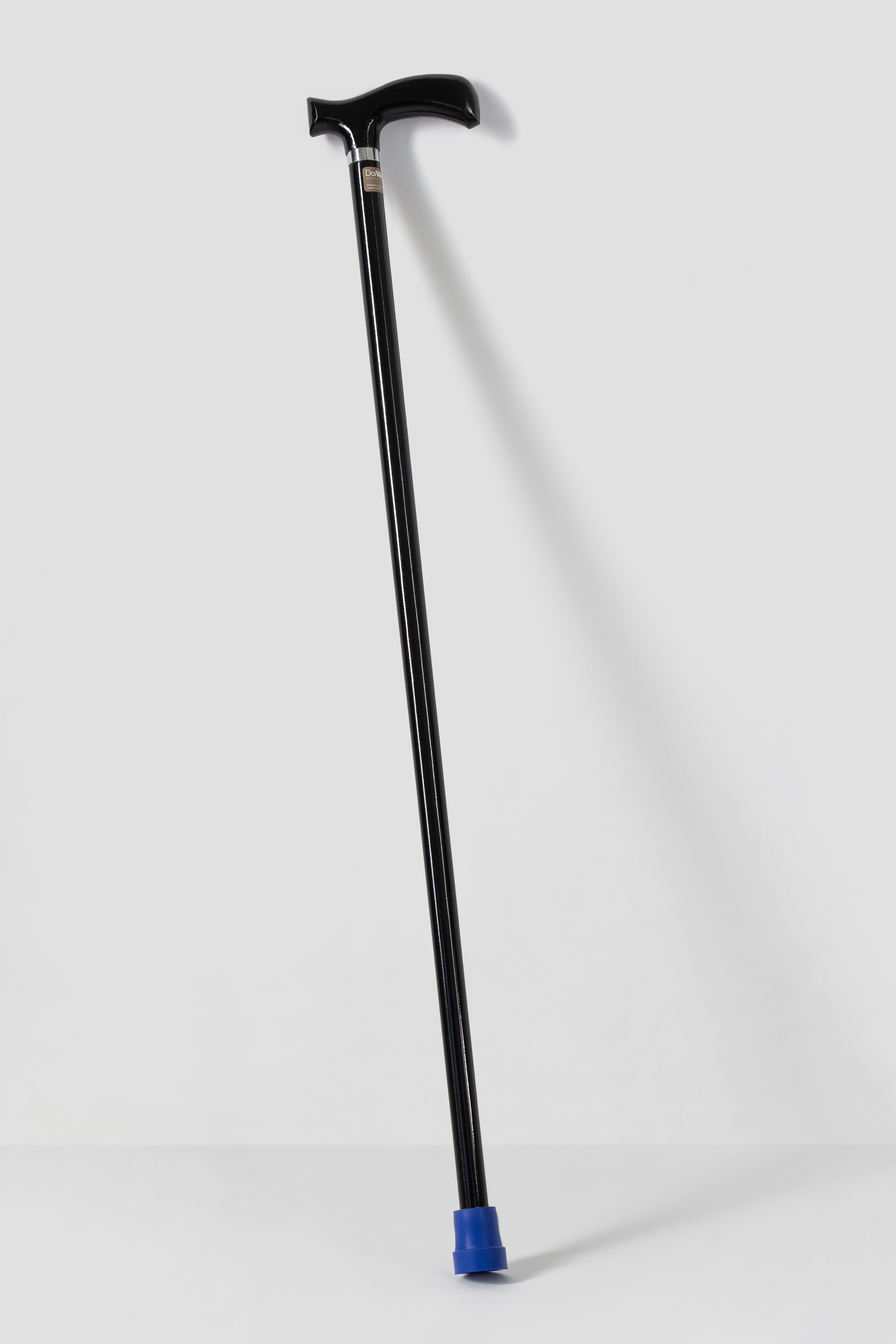 Total black minimalist walking cane with black shaft. Stealth design premium mobility tool for modern users.