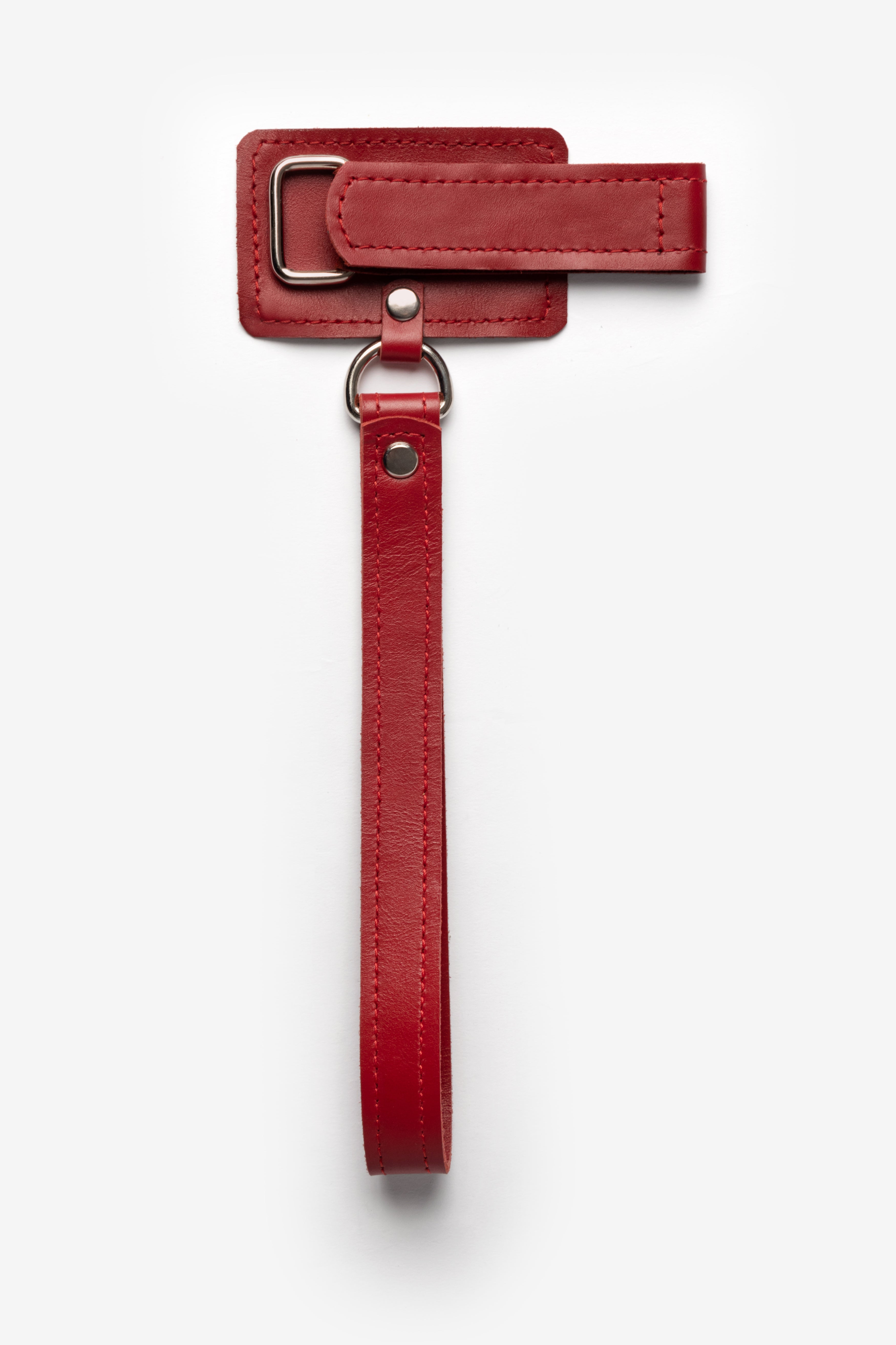 Travel-friendly leather wrist loop for folding canes.