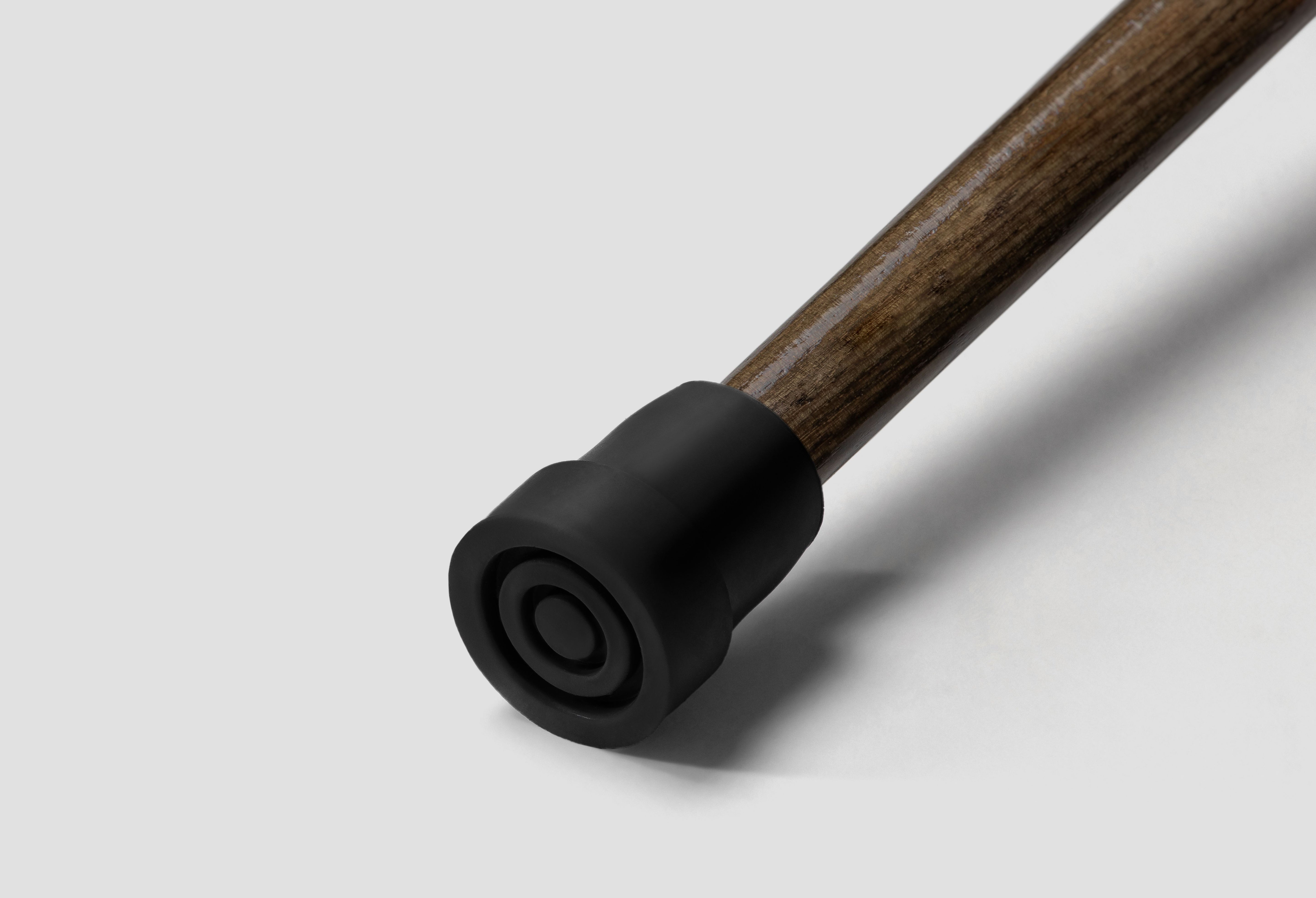 Heavy-duty black rubber tip replacement for DaiWalk walking canes. Non-slip traction base for stable and silent outdoor support.