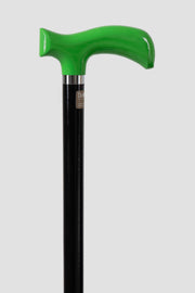 Traffic Green walking cane with glossy anatomical handle, black shaft, and signature silver ring.