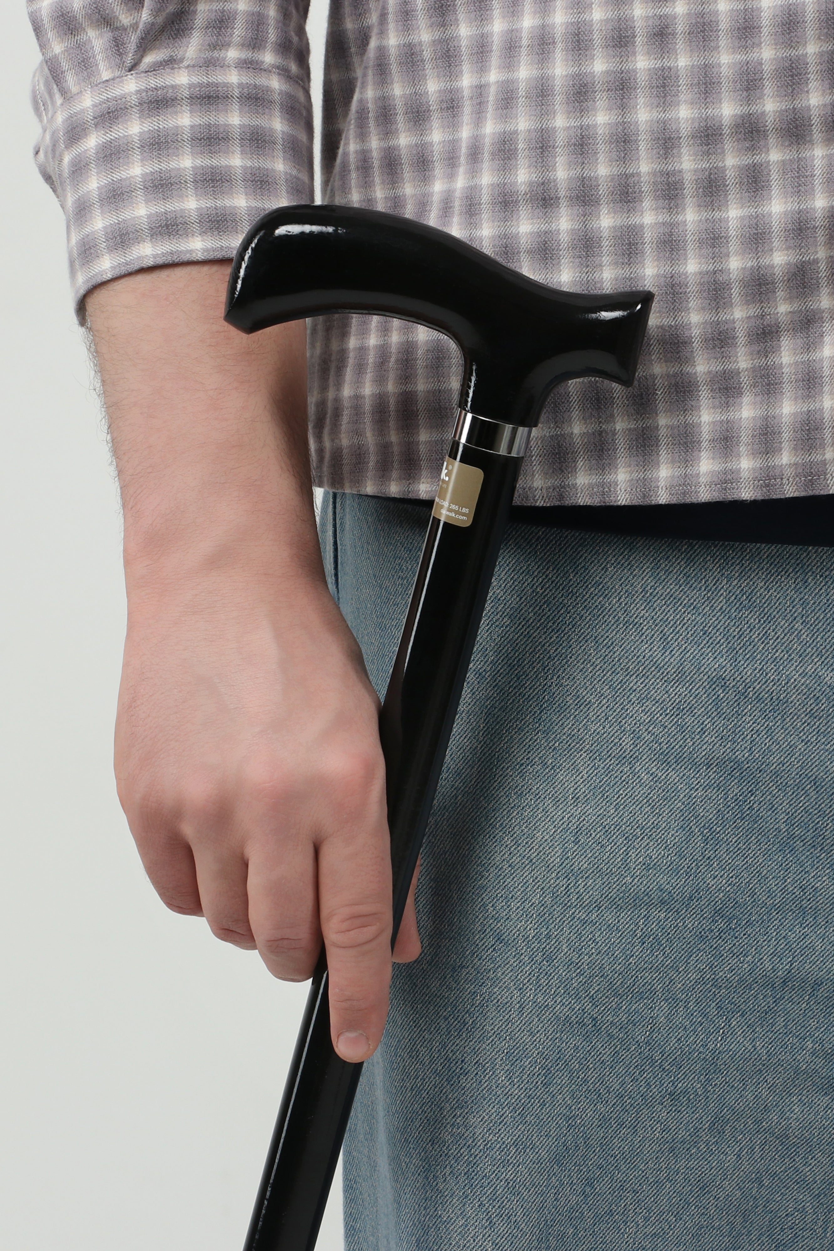Total black men’s walking cane with black handle and black shaft. Ultimate minimalist luxury mobility tool for active men.