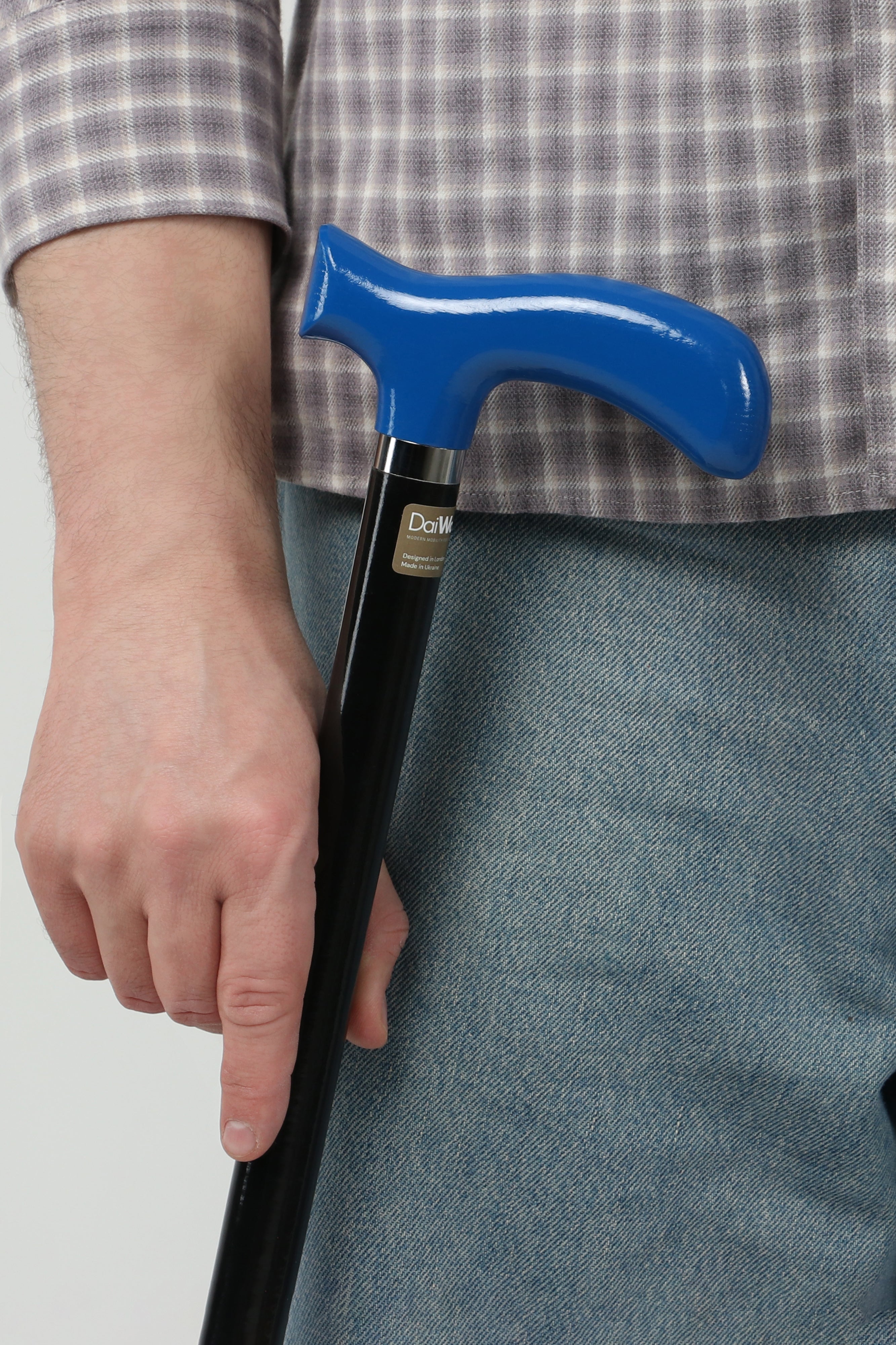 Stealth blue handle walking cane on matte black shaft for men. Silent performance premium mobility tool for modern users.