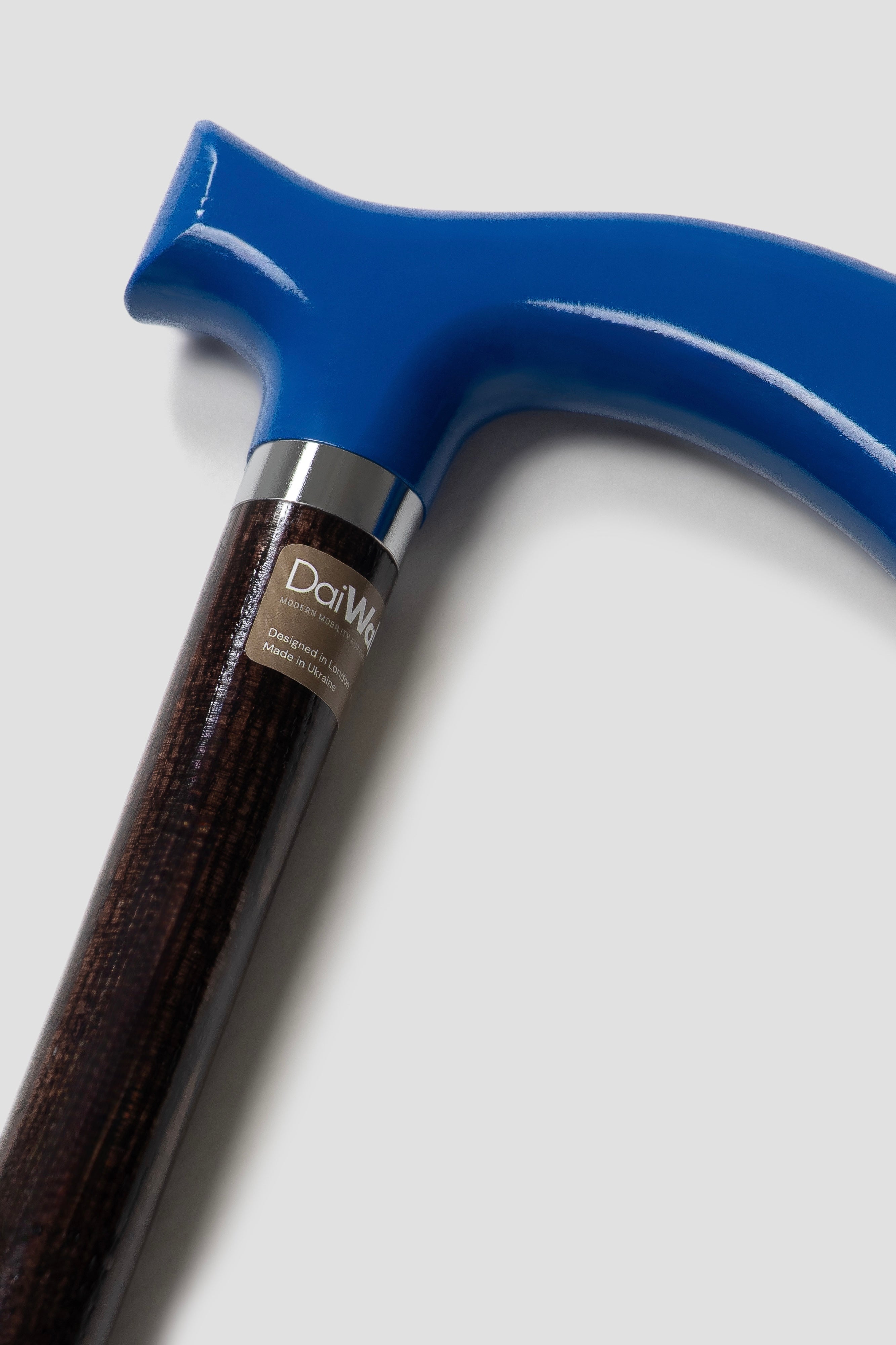 Executive men’s walking stick with blue handle and dark walnut oak finish. Bespoke designer cane for professional support.