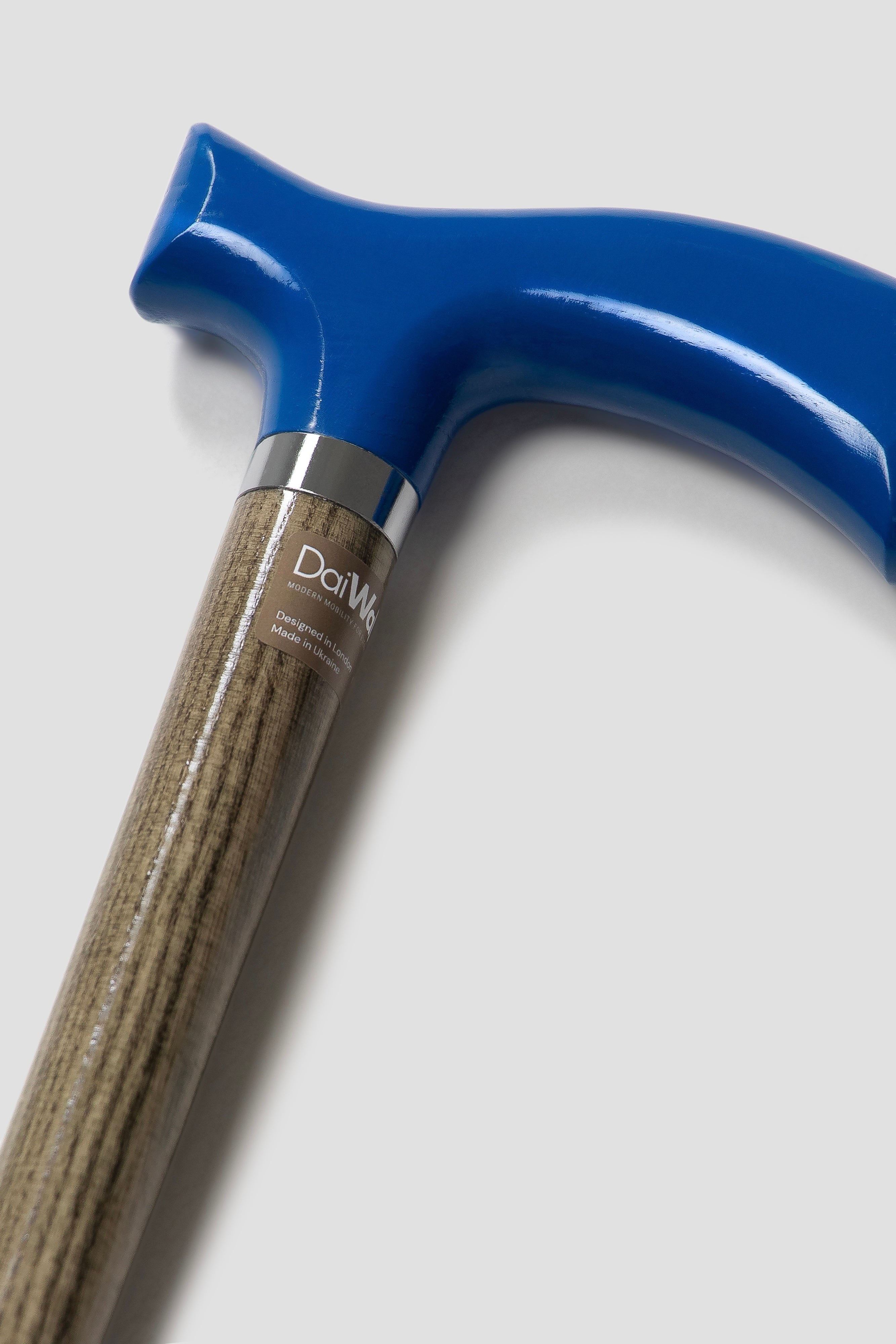 Men’s deep blue handle walking cane with light oak wood. Precision-engineered luxury mobility aid for stable walking.