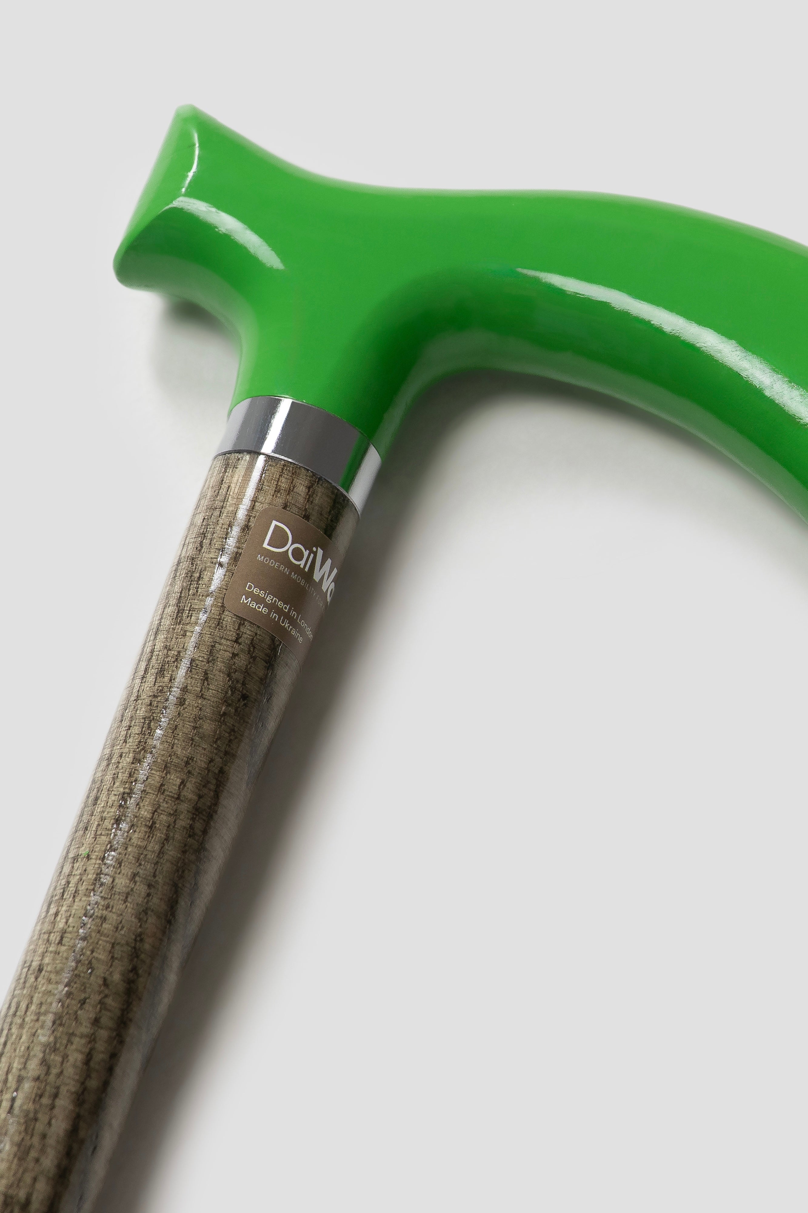 Men’s luxury walking cane with traffic green handle and light natural oak wood. Premium designer mobility tool for active men.