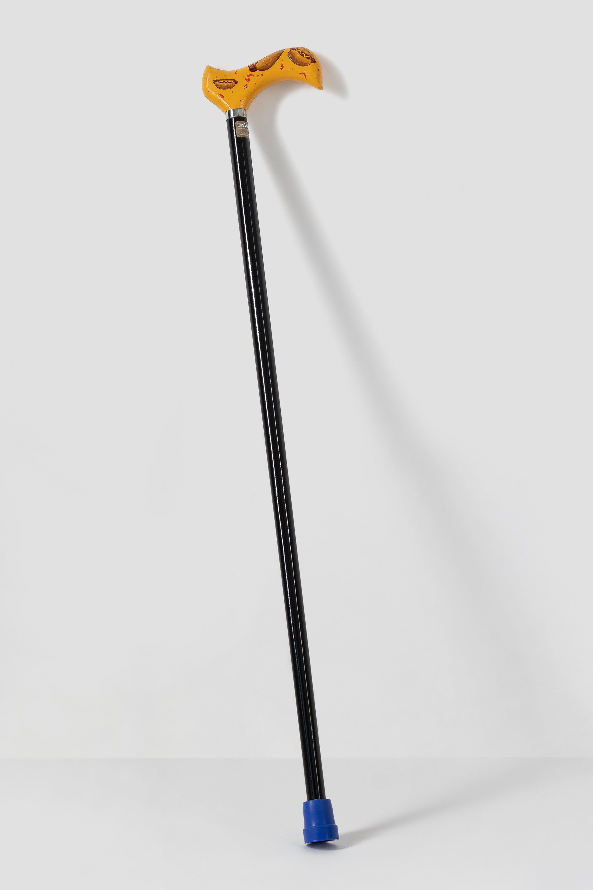 Vibrant pop art pattern walking cane with anatomical grip. Artistic designer mobility aid for high-visibility and bold personality.