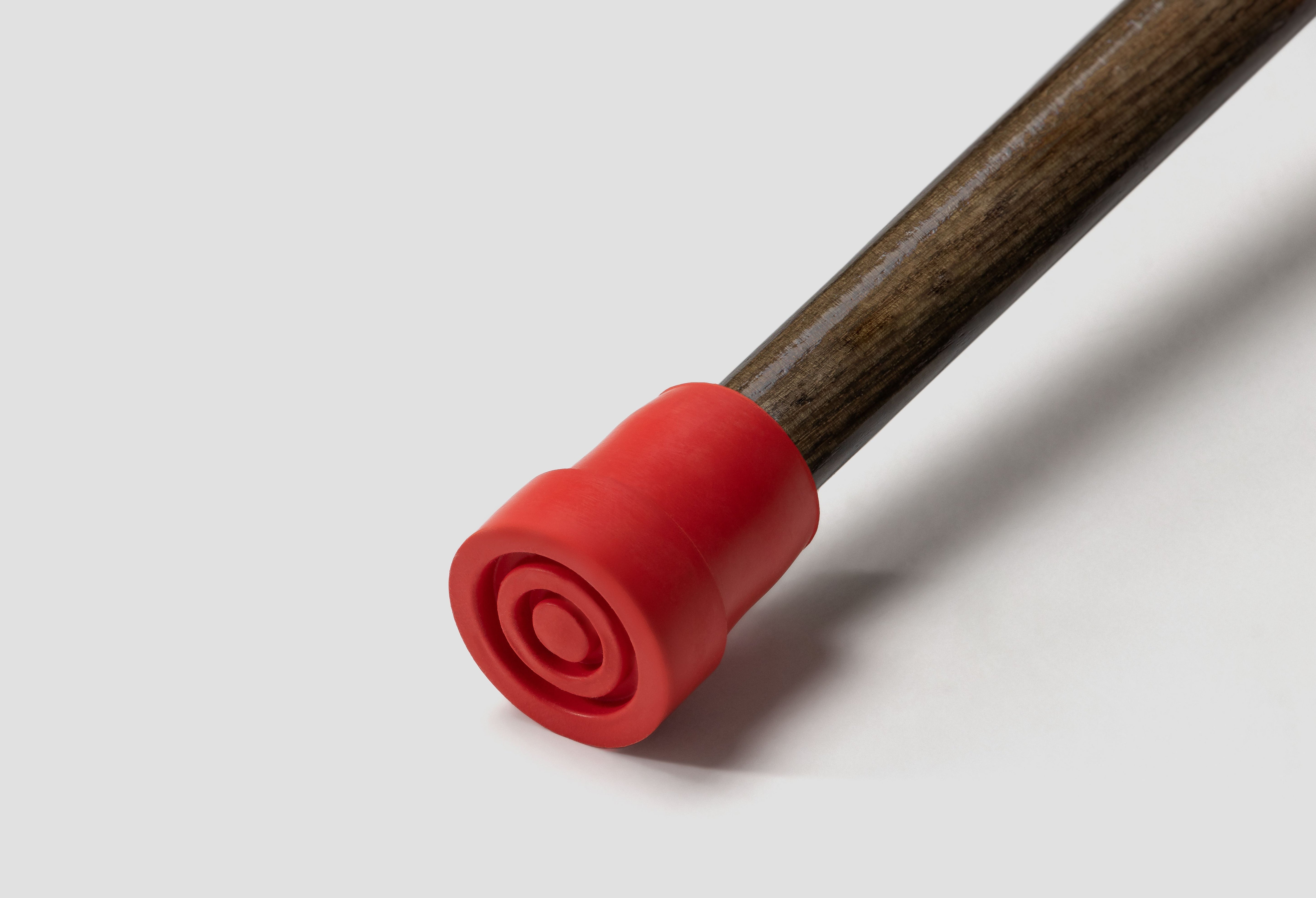 Shock-absorbing rubber cane tip for silent walking experience. Premium replacement base for reducing wrist impact and noise.